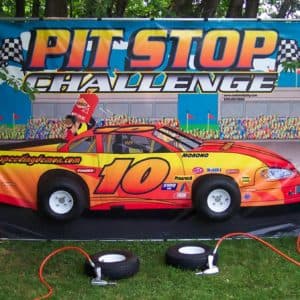 Pit Stop Challenge Tarp game rental photo — BSA Events