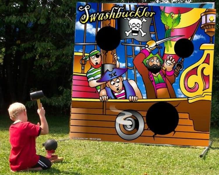 Tarp toss game - Pirate Ship Cannon Launcher rental photo — BSA Events